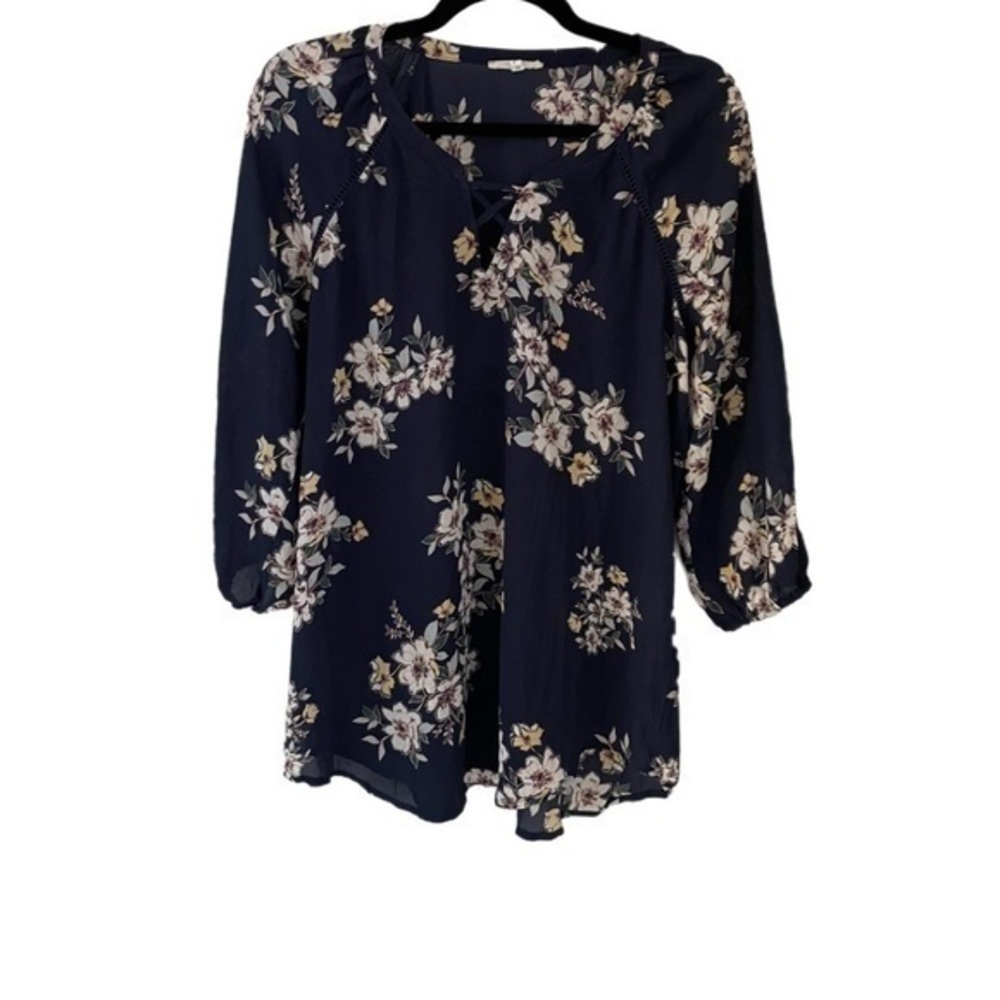 Maurice floral, sheer top size medium.